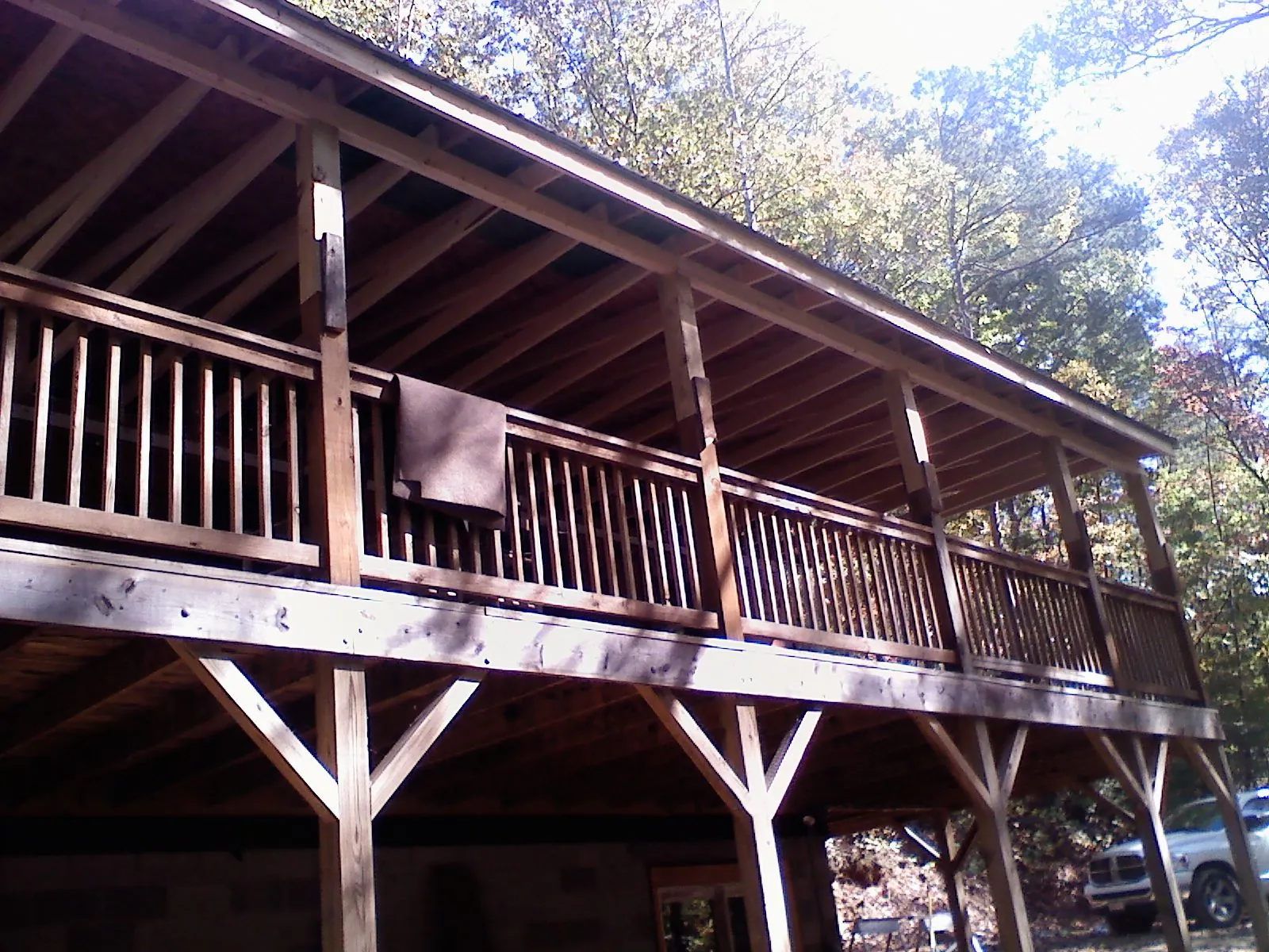 Timber framing under a new elevated porch and deck — Roof Leak Repair in Erin by Roofing Brothers